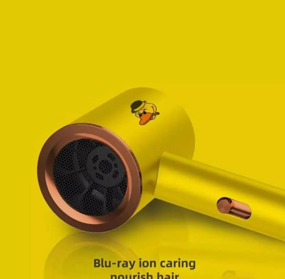 Yellow Hair Dryer with Cartoon Design